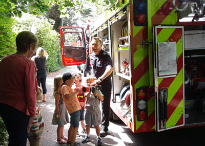 Fire service visit - Children exploring the fire engine